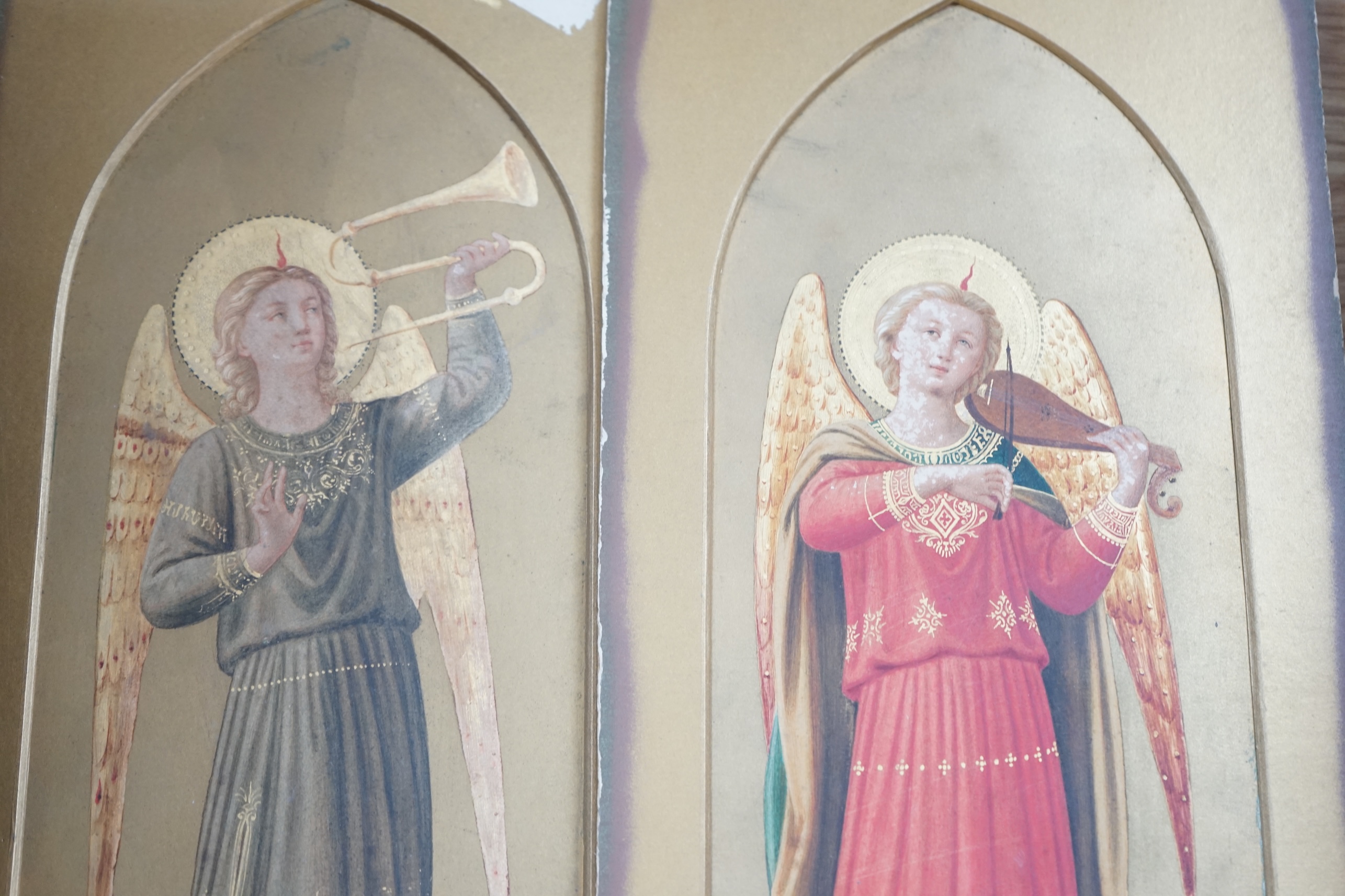 Style of Fra Angelico (Italian), pair of 19th century gilt and watercolour studies, Heralding angels, 31 x 11cm, mounted, unframed. Condition - fair, general wear